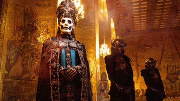 A photo of Papa Emeritus and two of the Nameless Ghouls